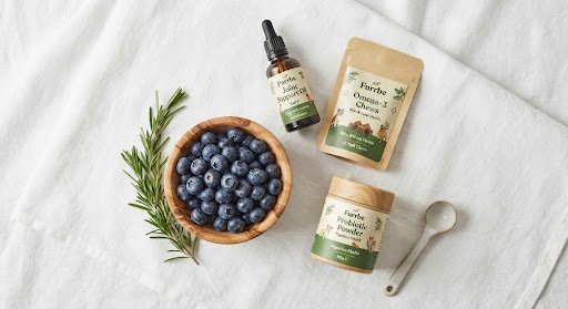 Organic pet supplements and fresh blueberries on linen